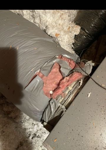 Torn and damaged ductwork insulation — this is what bad ductwork looks like